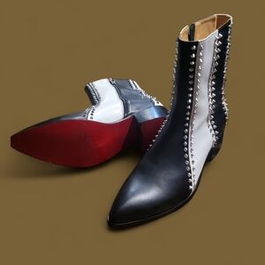 Christian Louboutin boots, size 44. Black and White.